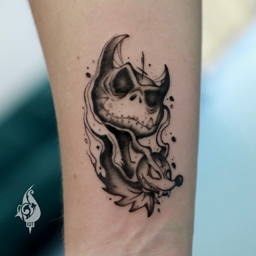 Explore ski mask tattoo ideas, creative tattoo ideas in Long Beach, available at Inky Dreams Tattoo