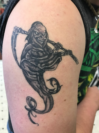 Explore sick tattoo ideas for guys, creative tattoo ideas in Seymour, available at American Gypsy Tattoo Corp.