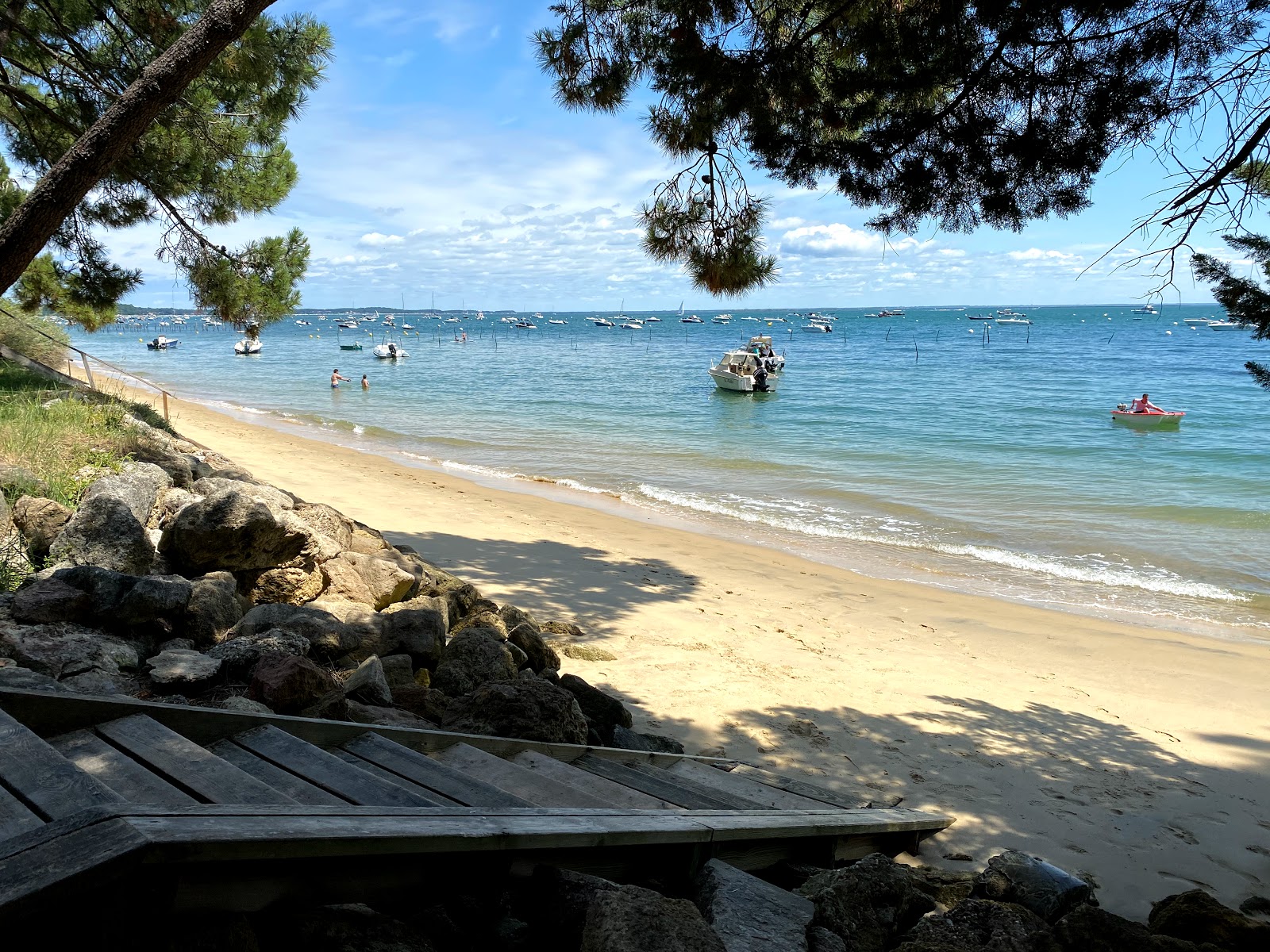 Foto di Plage des Americains con una superficie del sabbia bianca