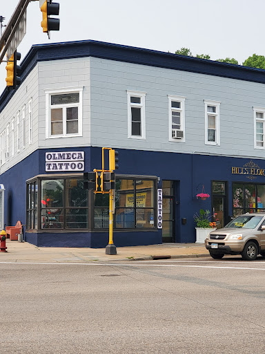 Explore open book tattoo ideas, creative tattoo ideas in Saint Paul, available at Olmeca Tattoo