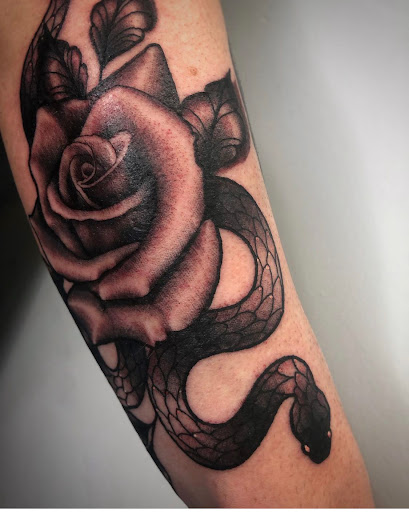 Explore march birth flower tattoo ideas, creative tattoo ideas in Adrian, available at Ambition Ink