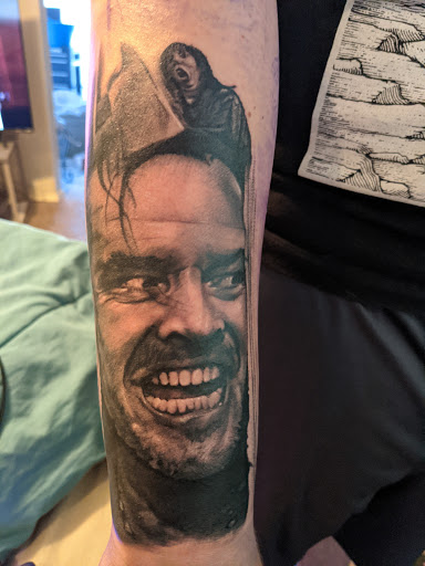 Explore black and white tattoo ideas for men, creative tattoo ideas in Amarillo, available at Puppeteer Ink Tattoo Studio