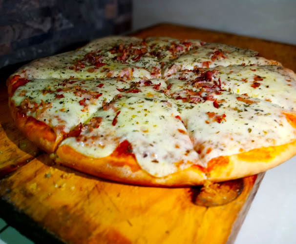 Opiniones de Pizza Planet en Canelones - Pizzeria
