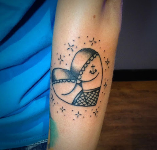 Explore song tattoo ideas, creative tattoo ideas in Asheboro, available at Blue Luna Tattoo Company, LLC