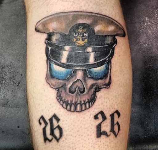 Explore bicep tattoo ideas for guys, creative tattoo ideas in Ottumwa, available at Family Tradition TattoosPiercings