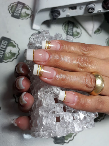 Logo da empresa - Manu Diniz Nails Designer