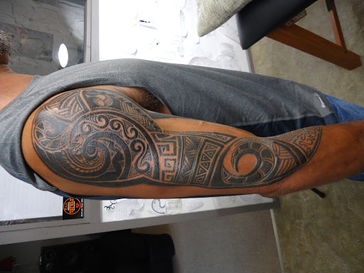 Explore tattoo over scar ideas, creative tattoo ideas in New Bern, available at Firehouse Tattoo.
