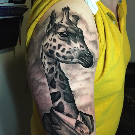 Explore mother tattoo ideas for men, creative tattoo ideas in Myrtle Beach, available at Elite Ink Tattoos of Myrtle Beach
