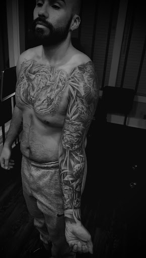 Explore black hole tattoo ideas, creative tattoo ideas in East Stroudsburg, available at Faimeouz Ink