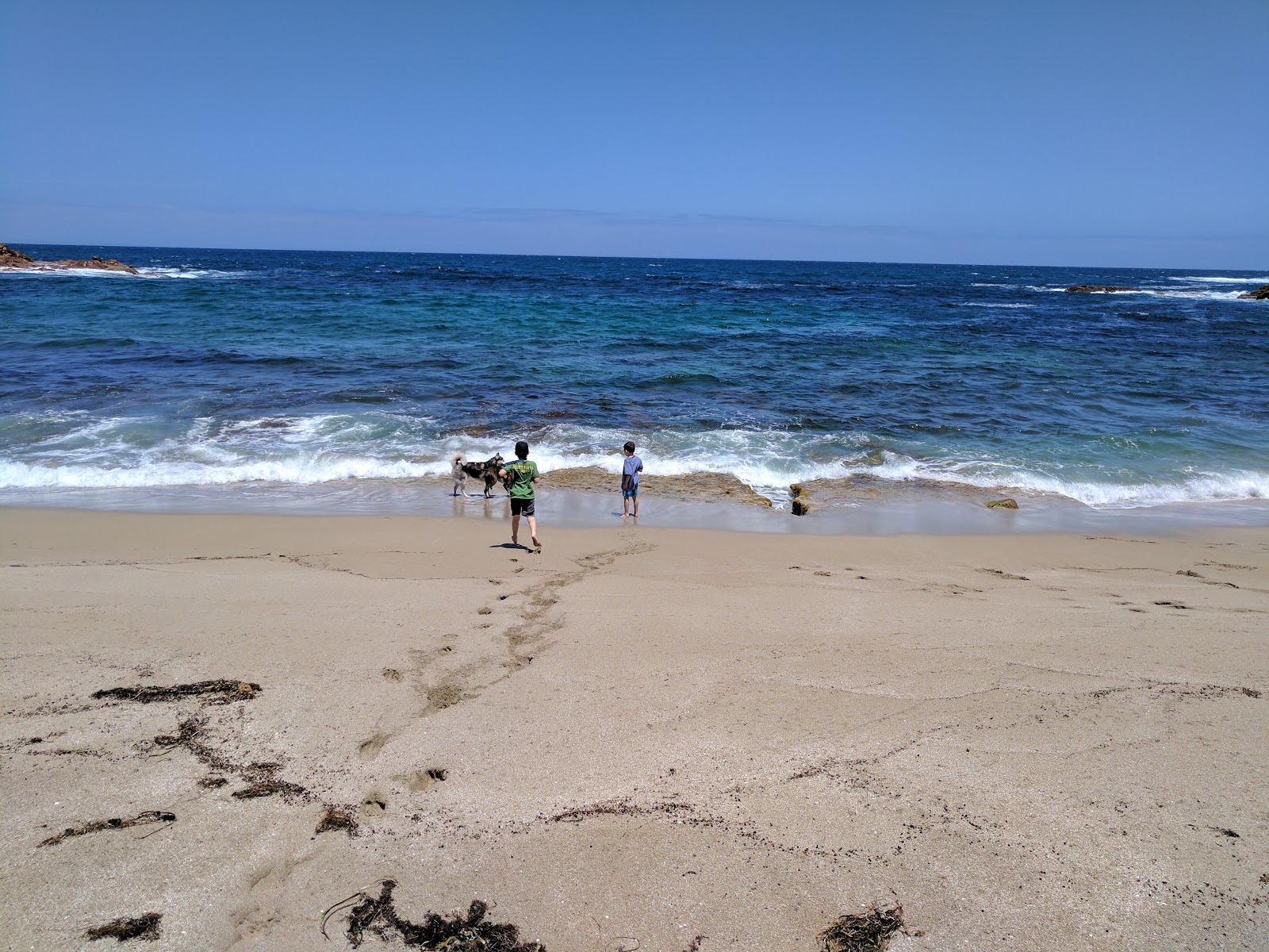Foto af Coffin Beach med turkis rent vand overflade