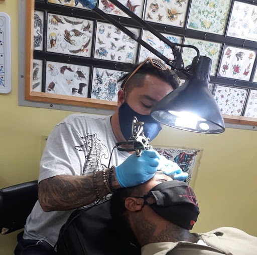 Explore fighting rooster tattoo ideas, creative tattoo ideas in Miami, available at Tattoos by Lou Miami - North Miami