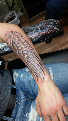 Explore gears of war tattoo ideas, creative tattoo ideas in Barre, available at Bury The Needle Tattoo