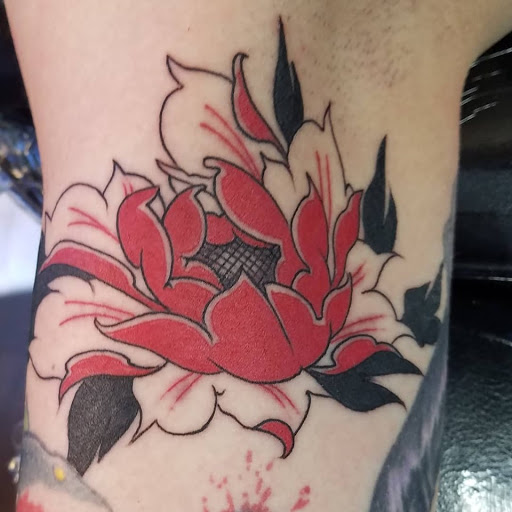 Explore rock n roll tattoo ideas, creative tattoo ideas in Reno, available at Evolution Tattoo