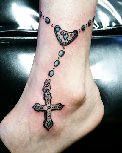 Explore tattoo ideas for moms with a son, creative tattoo ideas in Erie, available at EliKingInk