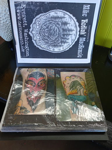 Explore butterfly cover up tattoo ideas, creative tattoo ideas in Everett, available at Tattoosmith & Company