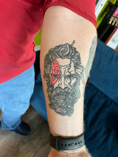Explore ignorant style tattoo ideas, creative tattoo ideas in Hartselle, available at Ethereal Alchemy Tattoo Collective