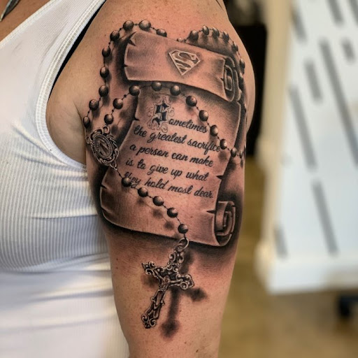 Find dino tattoo ideas for your next unique tattoo in Maryland Heights at Thirteen Roses Tattoo & Aesthetics