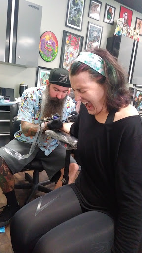 Explore ideas for spine tattoos, creative tattoo ideas in Tampa, available at Momentum Tattoo Tampa