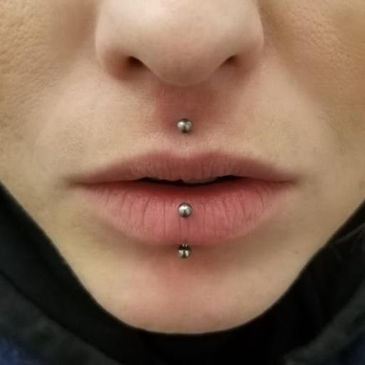 Explore tattoo ideas for 2 daughters names, creative tattoo ideas in Elko, available at Custom Tattoos and Body Piercing Studio