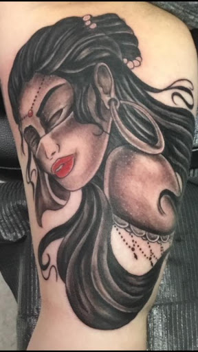 Explore singer tattoo ideas, creative tattoo ideas in Sanford, available at Hudson & Company Tattoo Studio