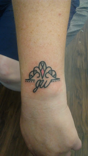 Explore dark souls tattoo ideas, creative tattoo ideas in Orange, available at Leftys Tattoo