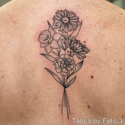 Explore cover up ideas for ankle tattoos, creative tattoo ideas in Fort Myers, available at Tiger Lotus Tattoo and Piercing