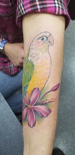 Explore small wave tattoo ideas, creative tattoo ideas in Springfield, available at Area 51 Tattoo