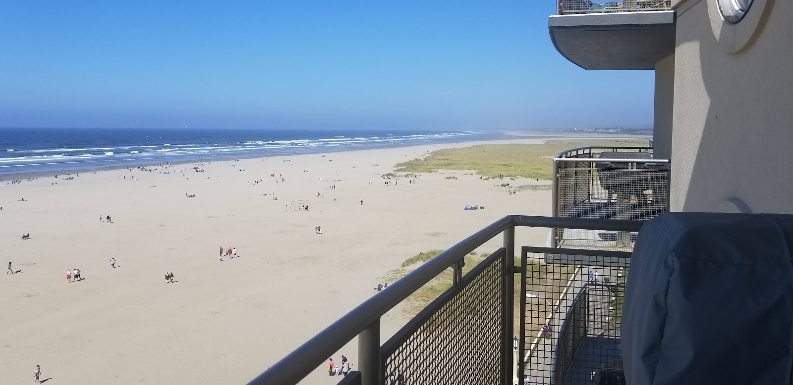 Fotografie cu Seaside Beach Oregon - locul popular printre cunoscătorii de relaxare