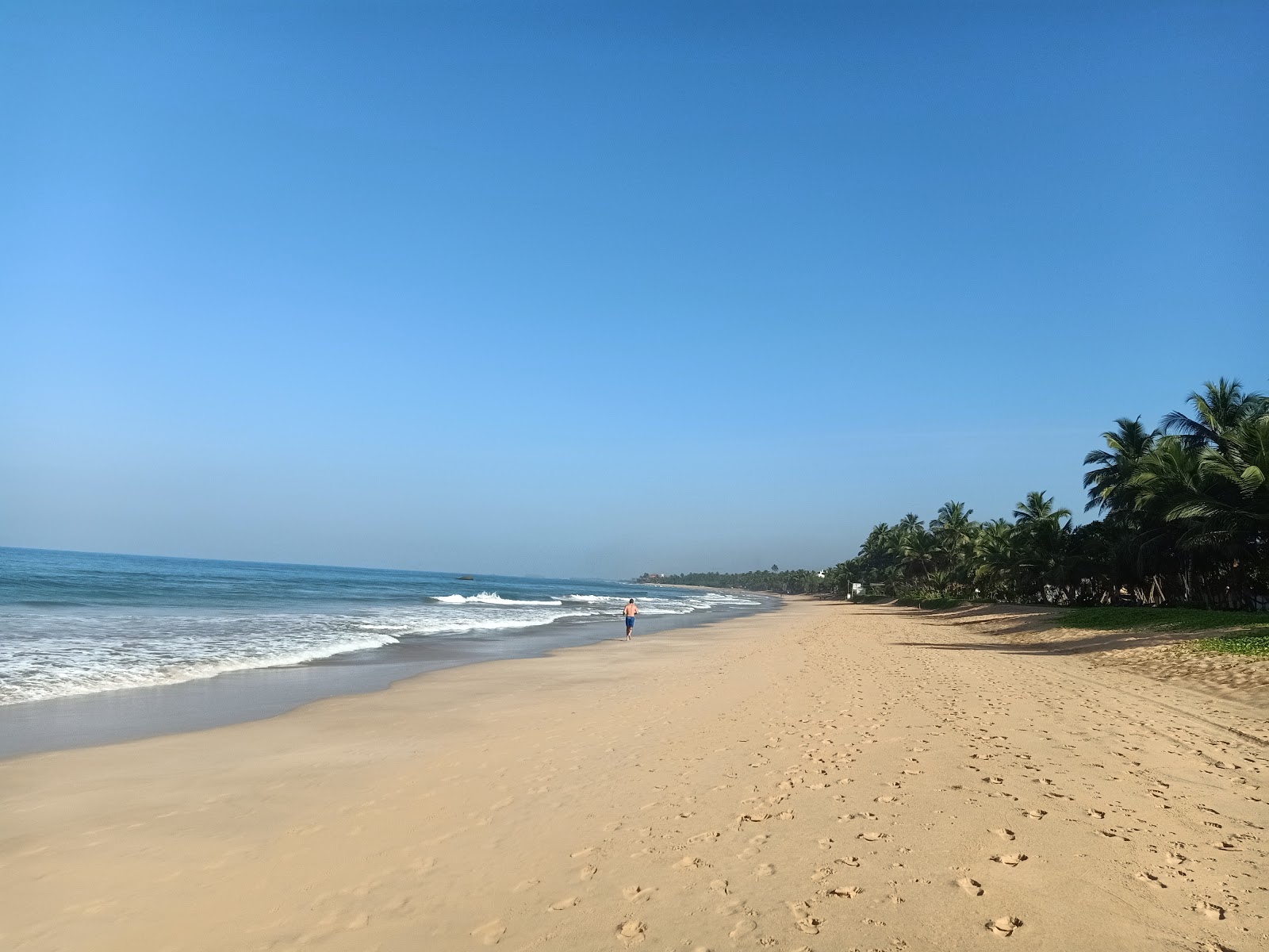Fotografija Sabaidee Beach z svetel pesek površino