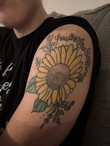 Explore tattoo ideas to cover up a name, creative tattoo ideas in Wallace, available at Artistic Abyss Tattoo Collective