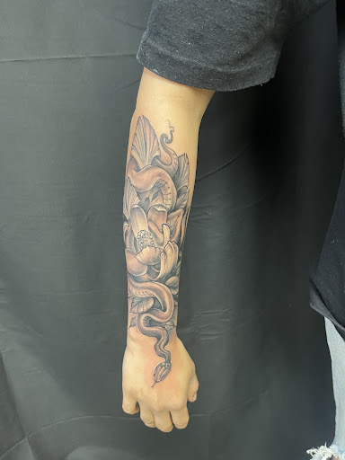 Explore large tattoo cover up ideas, creative tattoo ideas in Maryland Heights, available at Thirteen Roses Tattoo & Aesthetics