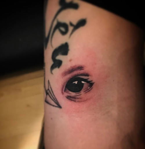 Find best female tattoo ideas for your next unique tattoo in Lawrence at Standard Electric Tattooing