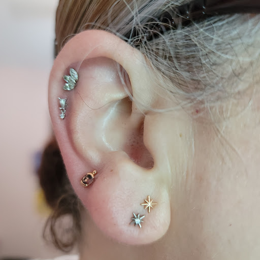 Explore name on neck tattoo ideas, creative tattoo ideas in Corona Del Mar, available at Rainbow Piercing & Jewelry