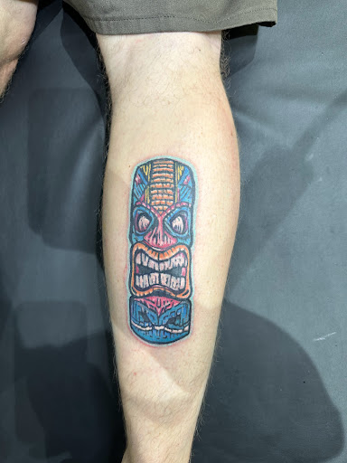 Explore minimalist tattoo ideas for men, creative tattoo ideas in Orlando, available at Good Vibrations Ink Tattoo and Body Piercing