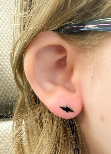 Explore mens rose tattoo ideas, creative tattoo ideas in Springfield, available at Body Piercing By Qui Qui