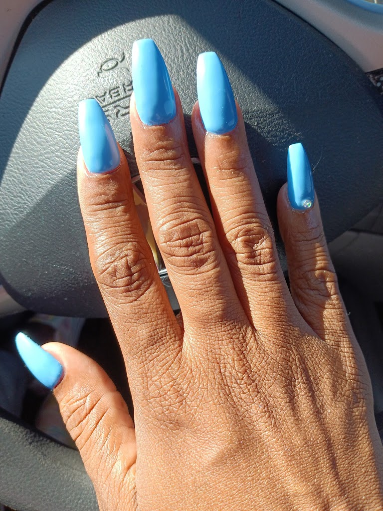 Q T Nails 63031
