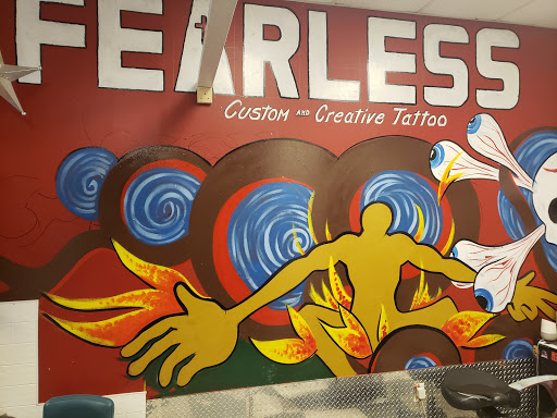 Explore caterpillar tattoo ideas, creative tattoo ideas in Anderson, available at FearlessTattoos and Piercing