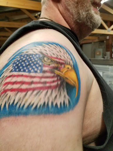 Explore half sleeve tattoo ideas forearm, creative tattoo ideas in Lansing, available at Ministry Ink Tattoo