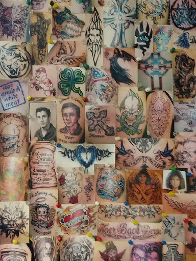 Explore rip neck tattoo ideas, creative tattoo ideas in Minerva, available at Wicked Tattooz