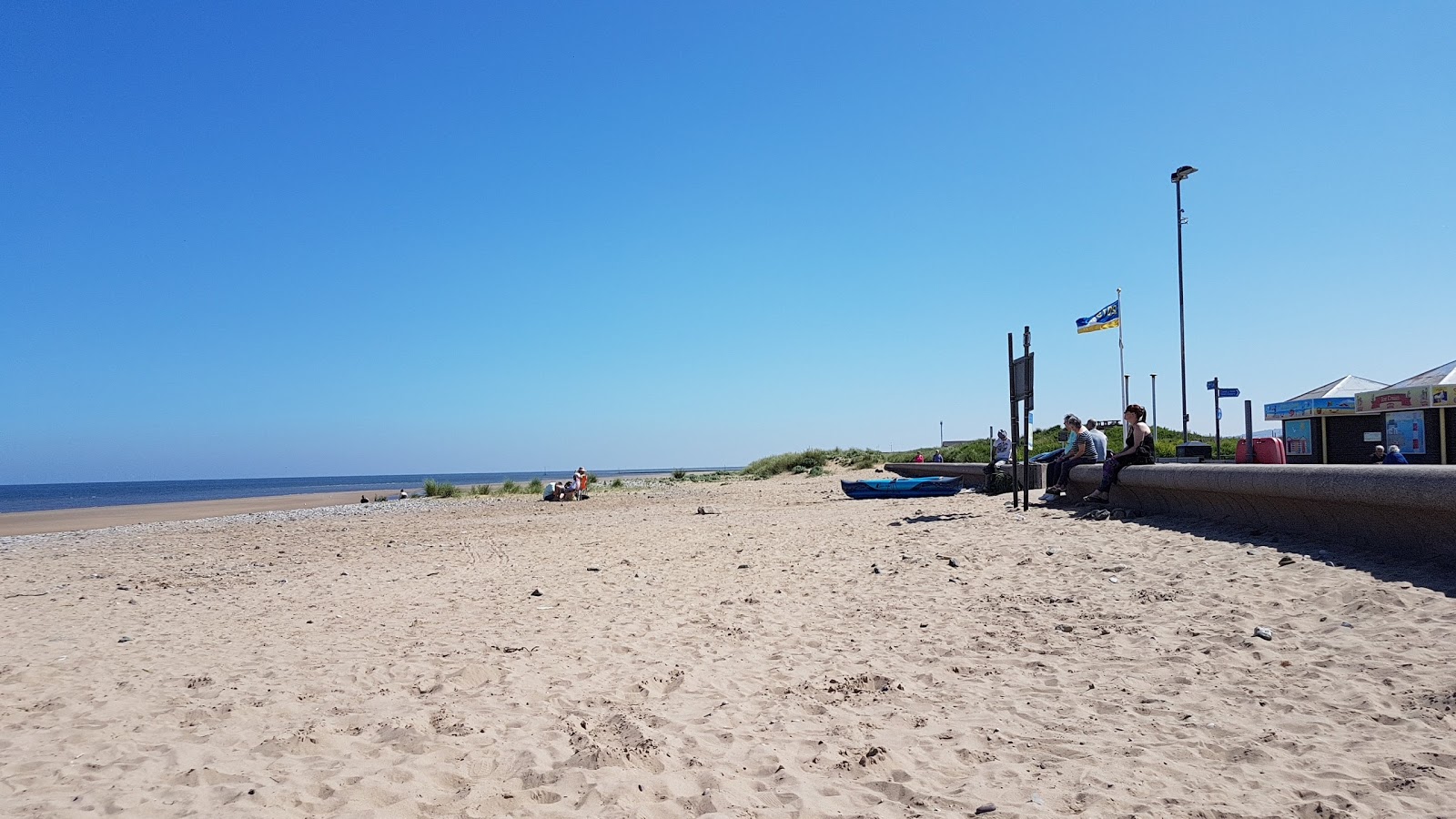 Foto van Kinmel Bay Beach met beige zand oppervlakte