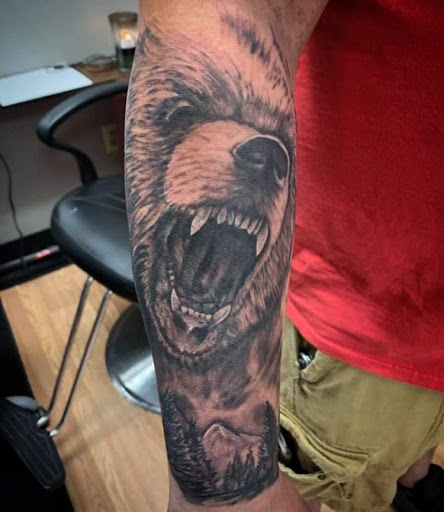 Explore curious george tattoo ideas, creative tattoo ideas in Hudson, available at Twisted Canvas Tattoo and Art Studio