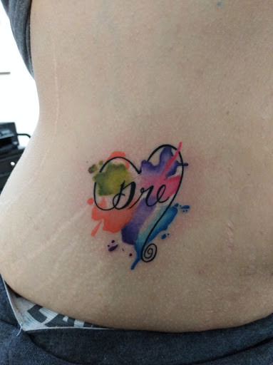 Explore tattoo ideas for new dads, creative tattoo ideas in Lufkin, available at Blue Lotus Tattoo & Piercing