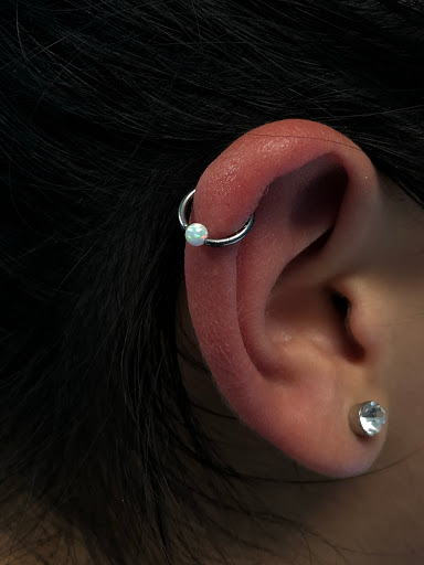 Explore ripped tattoo ideas, creative tattoo ideas in Murrieta, available at Diamond City Tattoo & Piercing