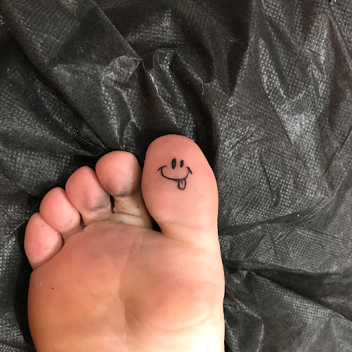 Explore rose tattoo ideas for guys, creative tattoo ideas in Las Vegas, available at Las Vegas Tattoo Collective, LLC