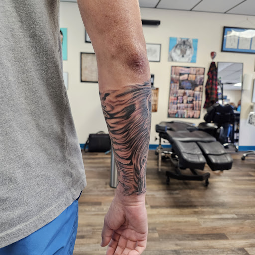 Explore half a sleeve tattoo ideas, creative tattoo ideas in Traverse City, available at Pinups & Needles