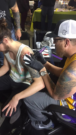 Find in between breast tattoo ideas for your next unique tattoo in Elk River at Ink Kings Tattoo