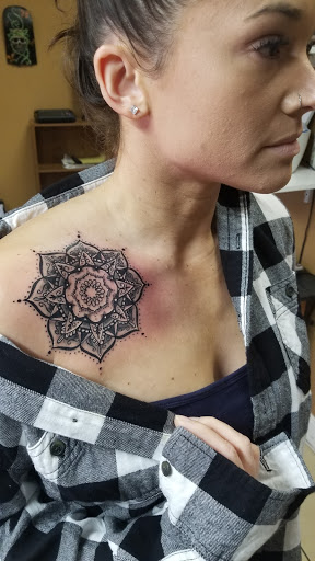 Explore floral arm tattoo ideas, creative tattoo ideas in East Providence, available at Ink Therapy