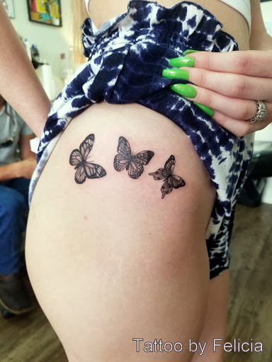 Explore leo tattoo ideas for women, creative tattoo ideas in Fort Myers, available at Tiger Lotus Tattoo and Piercing