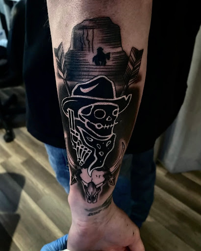 Explore male ankle tattoo ideas, creative tattoo ideas in Hesperia, available at Logic Ink Tattoo & Piercing