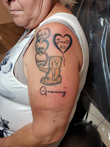 Explore tattoos for son ideas, creative tattoo ideas in Crystal River, available at Radiant Custom Tattoo & Body Piercing